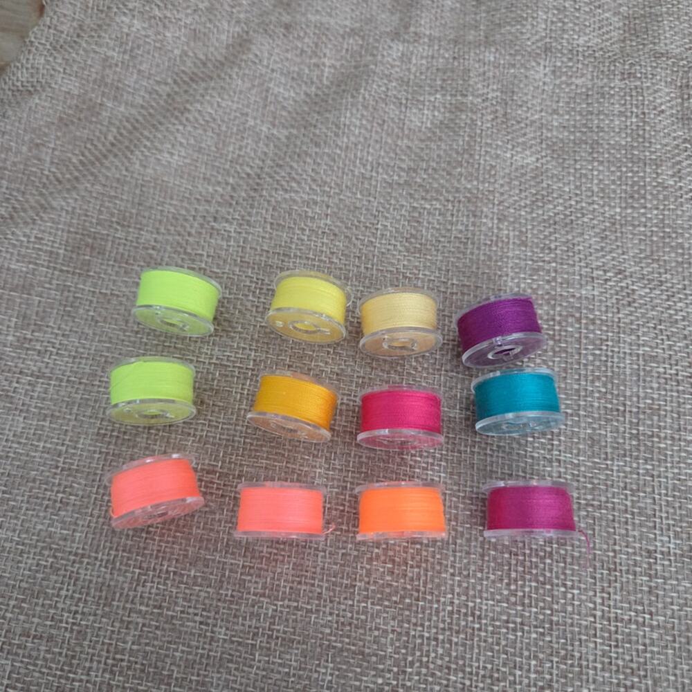 Pre-wound bobbin threads for sewing 12